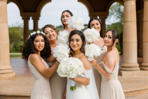 Bride and bridesmaids on a wedding day captured by Carlsbad Photo at Fairmont Grand Del Mar 5 Wedding Preparation Tips: How to Look Best on Your Big Day Creating Magic With Voted Best Carlsbad Wedding Photographer
